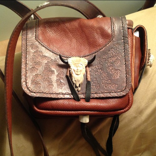 I am a  leather crafter, I specialize in making Bible covers for friends and others all over the world and I make quite a number of other items.