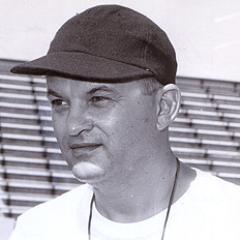 College football coach at Bowling Green State University 1955-64. 77-11-5 all-time record. Five Mid American Conference championships. 1959 National Champions.