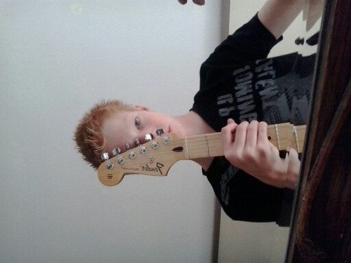 ik speel gitaar