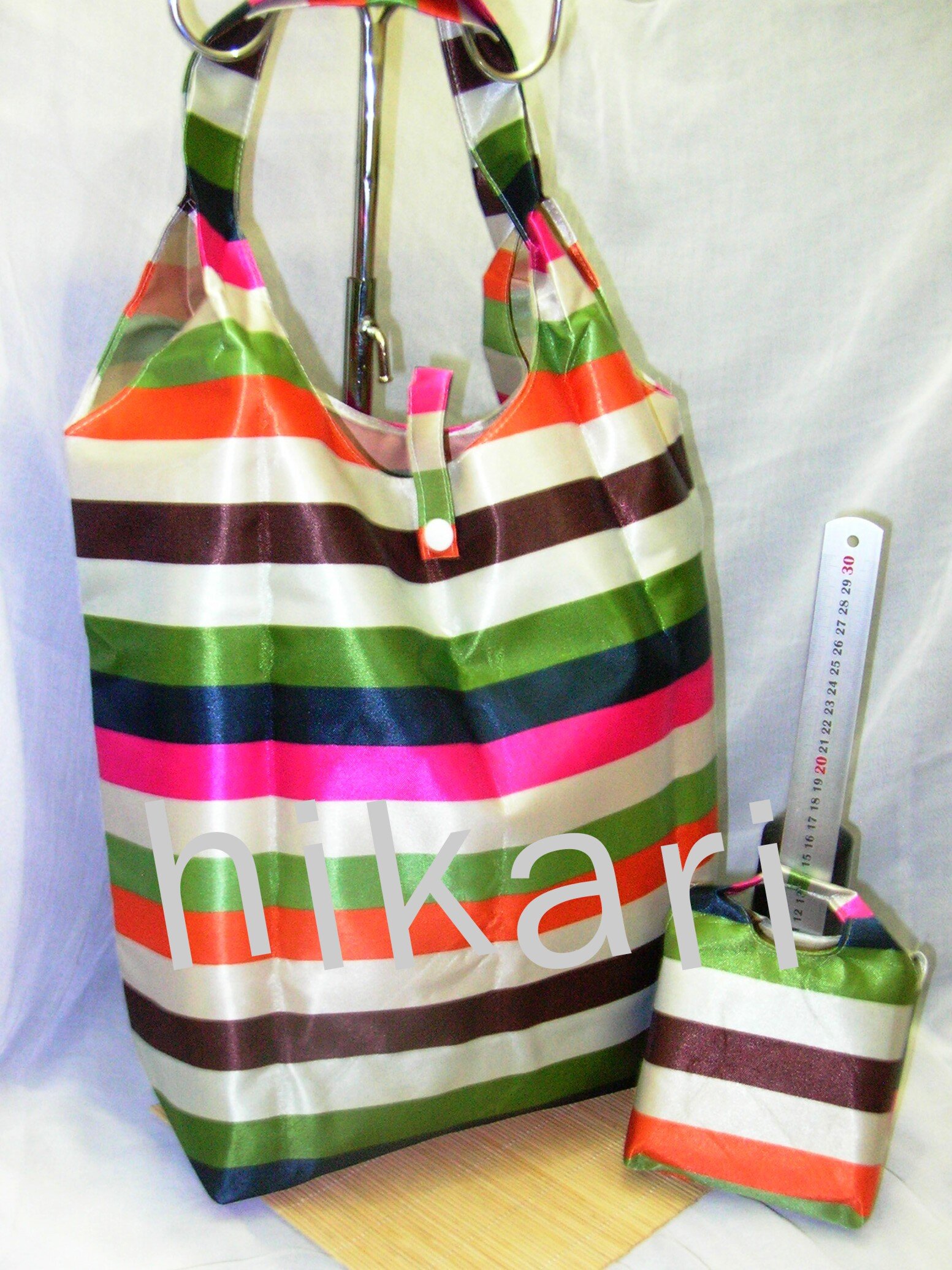 hikarihikashop's profile picture. Jual Tas Lipat motif glossy dan bludru | #taslipat