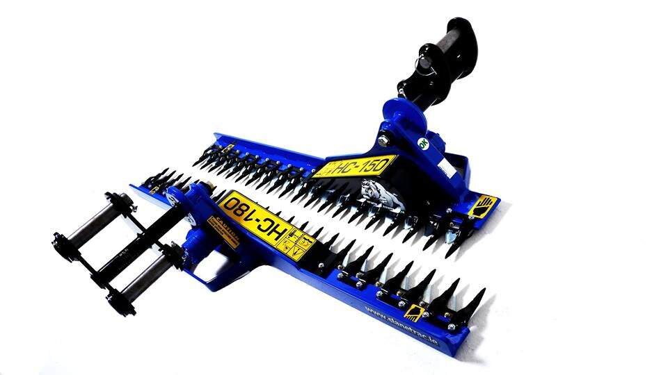 Slanetrac Engineering based in Ireland manufacturing mini tracked dumpers and hedge cutters for mini digger