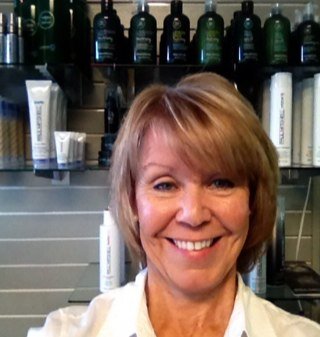Norma khoury owner of Green Apple Haircutters in South Miami since 1980, I love doing hair!