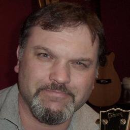 I'm a freelance professional musician and guitar teacher. I live in a little beach house with my wife Nanette and son Matthew.