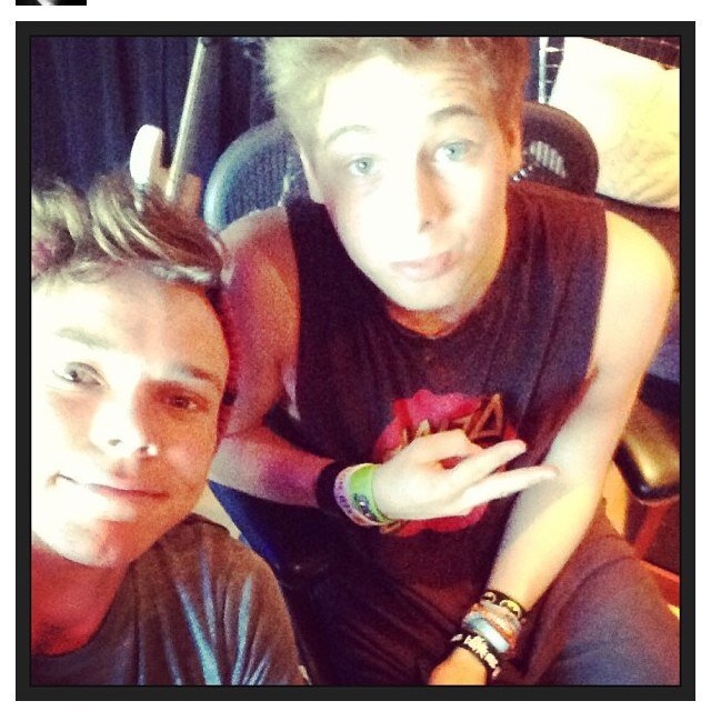 We love OneDirection and 5SOS(: Follow us we follow back(: