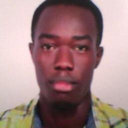 Am shinning black with curly hair and red lips a God fearing man,when u see me u will know me better....