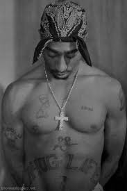 the best images and phrases from the story best rapper, Tupac Shakur