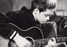 I'm niall , I'm in one direction and I play an instrument with six strings on it