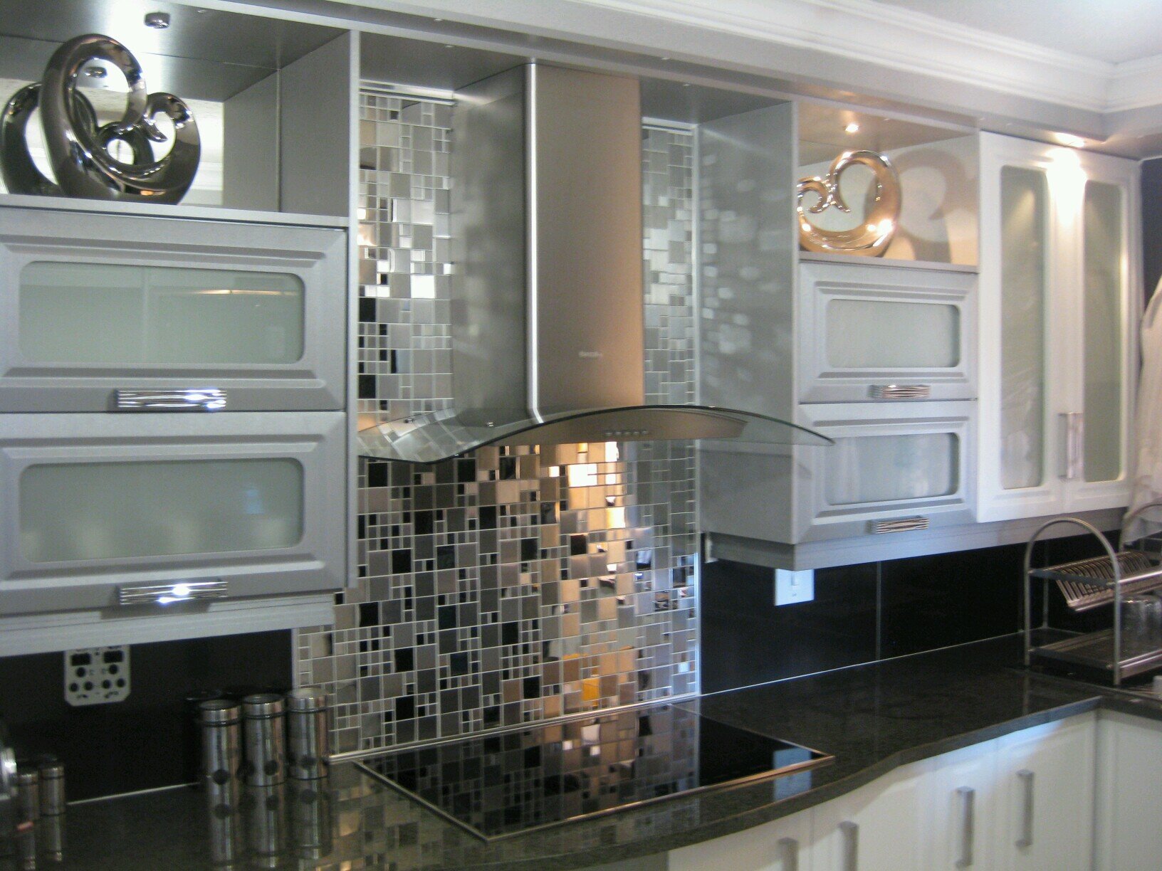 Kgomon is a black owned company specialising in interior designing: designer kitchens, bedrooms, bathrooms and customizing. U can contact us on: 012 797 2005. W