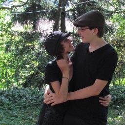 Engaged nerdy couple who love video games and having fun.