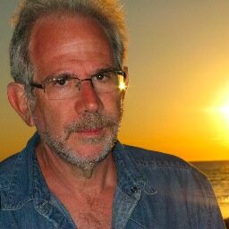 Iconoclast bad mood travel writer, prize-winning novelist, ex-Wall St Journal food/arts columnist, China hand, Brazil nut, beisbol poet, prose stylist, glutton