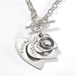 Mum-of-two making Smallprint jewellery - handcrafted, beautiful gifts that capture your child's drawing, finger or footprint in fine silver.