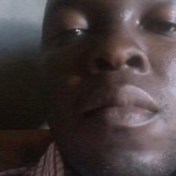 african teacher spewing and spinning wisdom to eradicate idiocy and stupidity replenishing knowledge,skills and attitudes