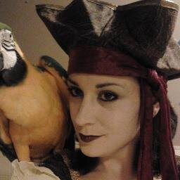 wiccan, pretend pirate, parrot rescue, writer, peer support, quirky, uppy/downy mood swinging half geek
