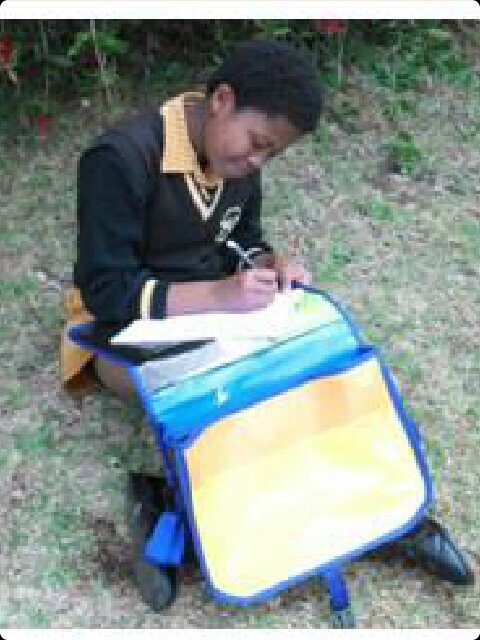 DeskBags were designed to alleviate the need for 3 million+ school desks in SA. It's a portable desk & school bag to use at school & home