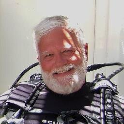 retired reporter, local school board member, scuba enthusiast, Santa for free