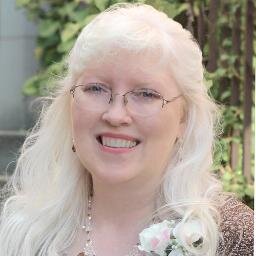 Christ-follower, wife, mother, homemaker, and scrap artist who enjoys expressing myself through color and design while recording our family history.
