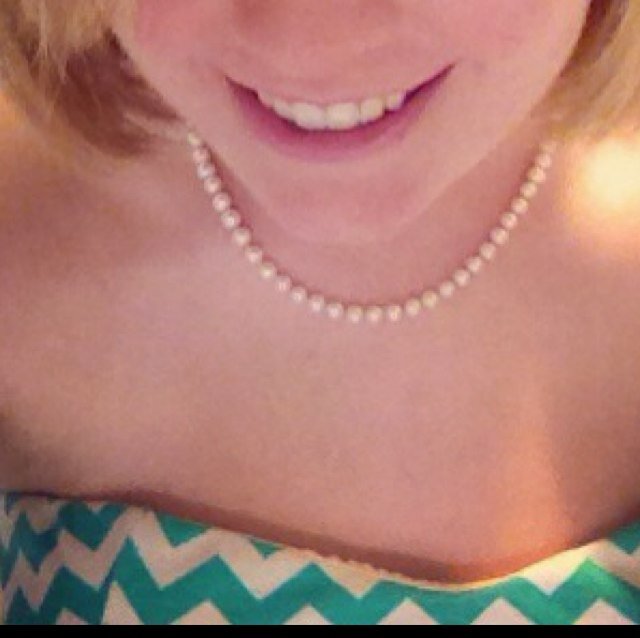 Sassy Kentucky Belle with a bow in her hair and pearls around her neck. KMSS sales rep. Avi is me.