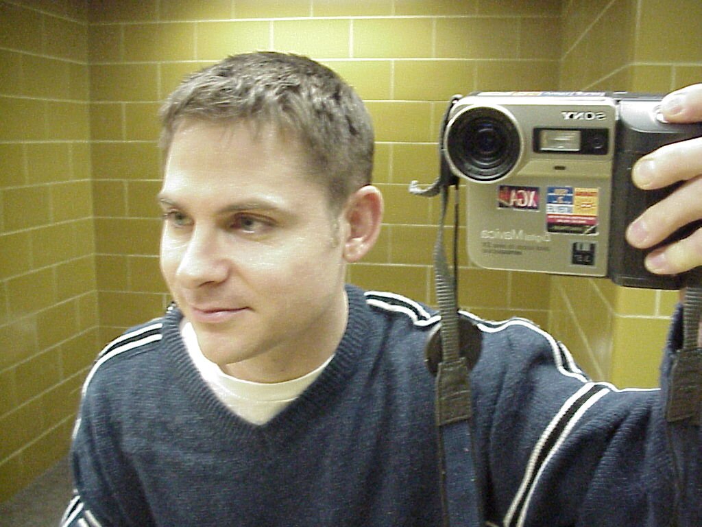 This is what bathroom selfies looked like in 2001. Higher Ed Web Conferencing Support Tech. Told jokes on a stage back when That Was a Thing