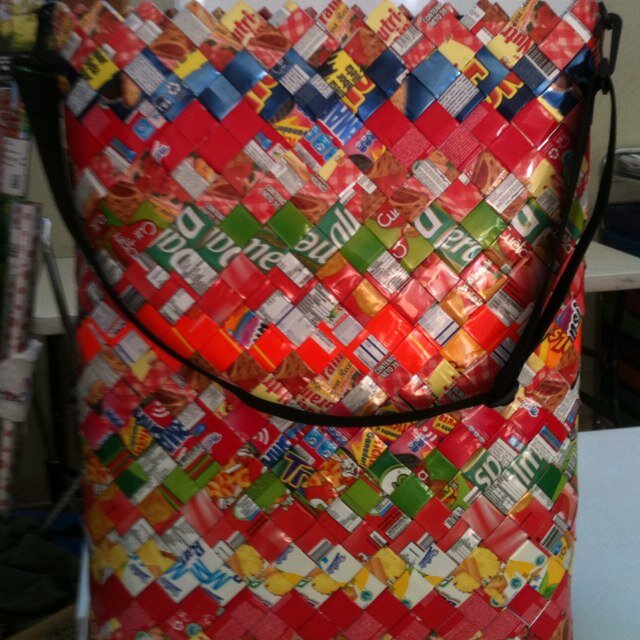 High fashion handbags handmade of recycled materials by political refugees.