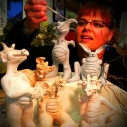 Hand-made from clay...goblins and dragons.