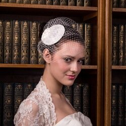 Arabella Bridal is an online bridal and wedding accessories shop specializing in classic, vintage, hand-made bridal birdcage veils and fascinators.