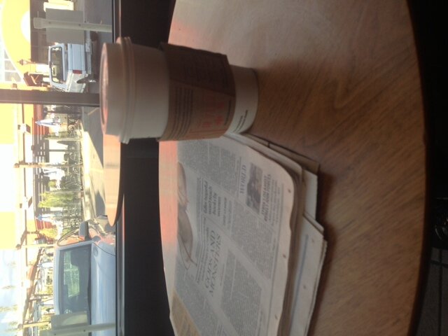 thebadbarista's profile picture. The coffee house - exposed in harsh lighting.