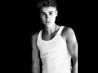 Justin Bieber makes my day ...* Just by hearing ons of his songs ..!!*
