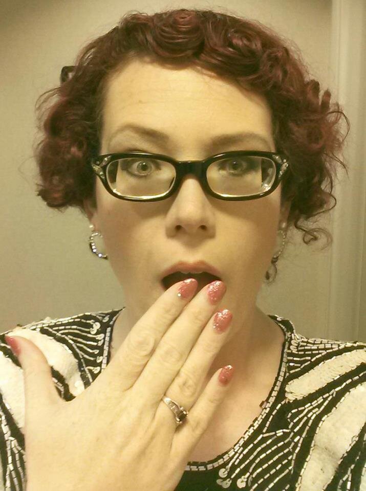 Burlesque performer and manager of Fat Cat Cabaret.