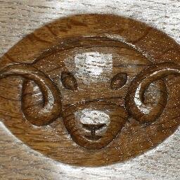 Handcrafted bespoke oak furniture, each piece embellished with a hand-carved rams head, my logo as a sign of quality and individuality.