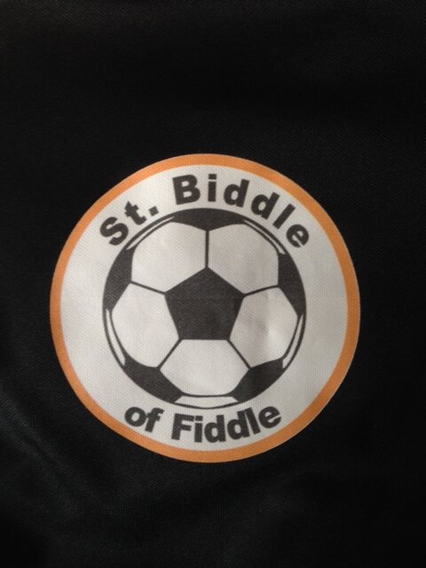 We are St Biddle of Fiddle FC. We play in the middle - with a fiddle.