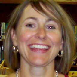 Elementary School Librarian, Favorite things to do - spend time with my family and read on the beach.