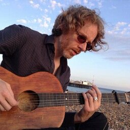 Folk/indie storytelling songs with beautiful vocals, fingerpicking acoustic guitar, cello, electronica and percussion. Think Nick Drake, Sufjan Stevens.