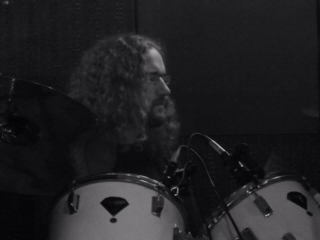 rugby loving, metal listening, comic adoring, sad, geeky nerd type. Drummer