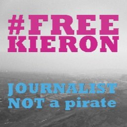 Kieron Bryan is a journalist. He is in a Russian jail, facing criminal charges and a lengthy jail sentence for filming a peaceful protest. He must come home.