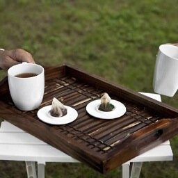 TopIt is tea cup cover that fits most cups/mugs for a perfectly brewed cup of tea.  Turn it over and use as a tea caddy after brewing.
