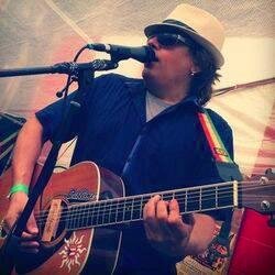 Singer * Guitarist * Songwriter * Local Music Advocate * Neighborhood Fixture * Pacifist Troublemaker