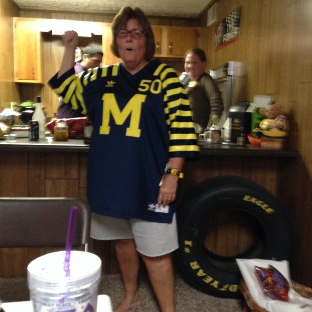 loves michigan football and hot sunny weather