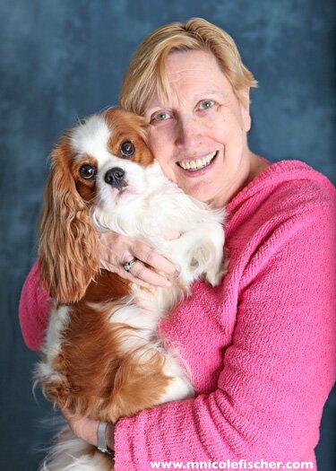 Journalist, theater critic, professor at University of New Haven, cabaret performer, Cavalier King Charles Spaniel owner