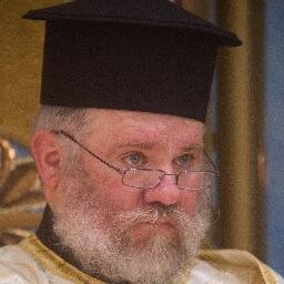 Deacon in the Greek Orthodox Metropolis of Chicago, Father of four, grandfather of three, husband of Romilie, blues guitarist/singer, hockey fan.