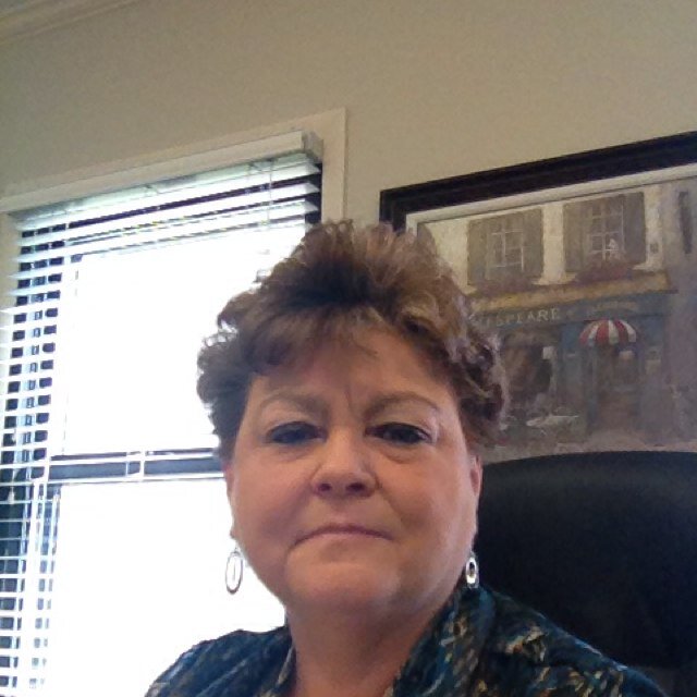 Executive Director-Housing Authority of Hopkinsville; married to Bruce Smiley. Two children-Casey and Kellye; Three Grandchildren - Rachel, Logan and Colton