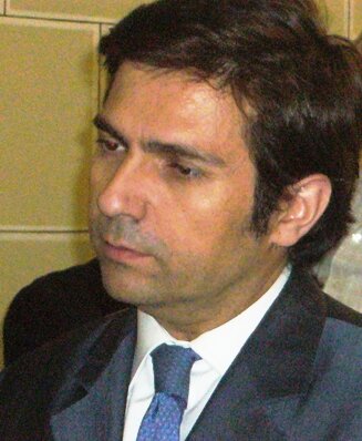 Economista, Católico, liberal en lo económico y conservador en lo político y social,auditor interno, blogero y profesor universitario