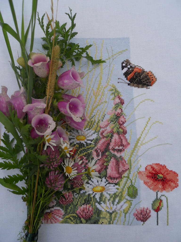 I love flowers, pretty things and stiching cross stich's