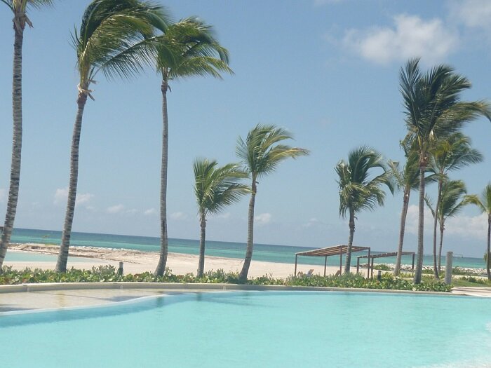Caribbean beach condo, modern secure super lux, 10 mins from Punta Cana int airport, Cap Cana. Ideal vacations, honeymoon or business. Bookings available VRBO