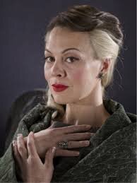 Pureblood. Slytherin through and through. Don't like me? *She laughs softly* I don't care.