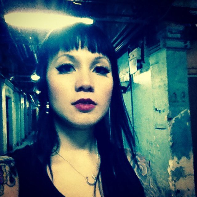 Jenny Woo is a Canadian artist who plays acoustic music influenced by oi! and punk rock. She also has a band in Russia and is signed to Randale Records.