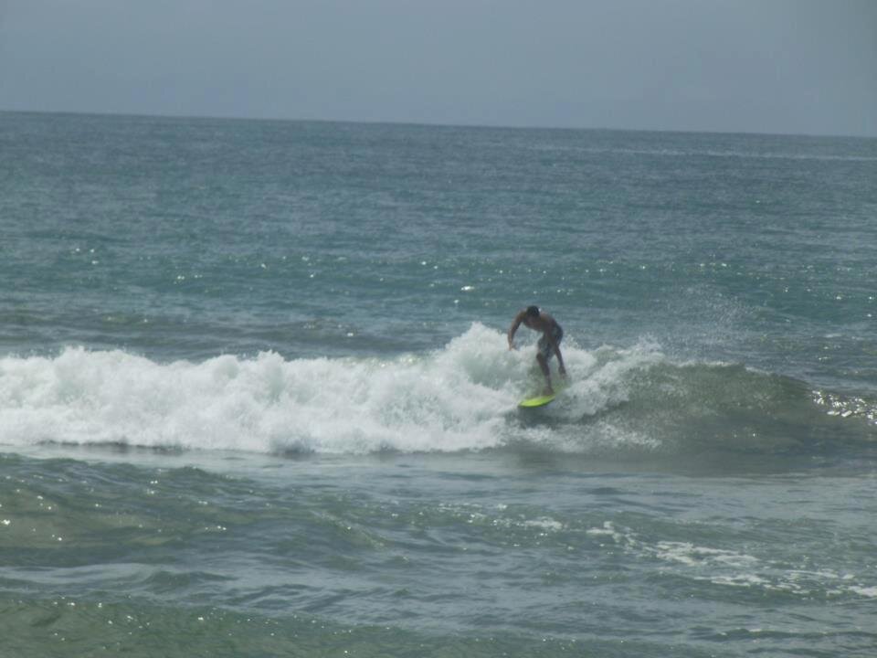 gosto de fazer um surf no  fim de  semana