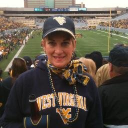 Flight attendant, loves WVU Mountaineers, studying IMC@WVU,travels. Designs specialty diaper cakes (airplanes). Promotes husband's books. Enjoys a good martini