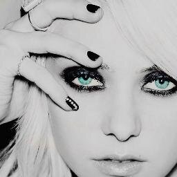 loves lady gaga and likes to play football baseball basketball really great at them singing awesome at that
