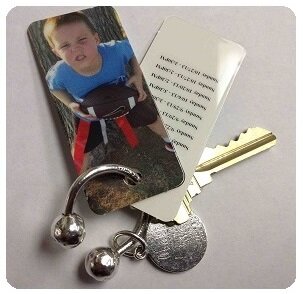 Your kid or pet photo on your keychain! Get a set of 3 for only $4.49 using code: team1  Made in Norman, OK USA!