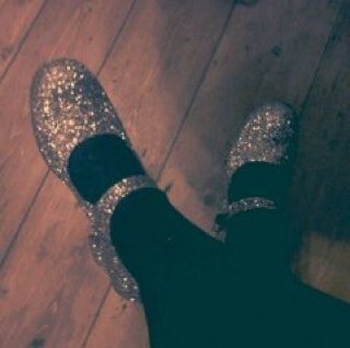 Taking bad pictures of bands with good shoes.